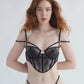 Black rigid tulle underwire bustier with liquid shine effect embroidery, adjustable straps