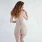 White rigid tulle underwire bustier with liquid shine effect embroidery, adjustable straps with matching thong with adjustable waist strap and mesh harness fully adjustable