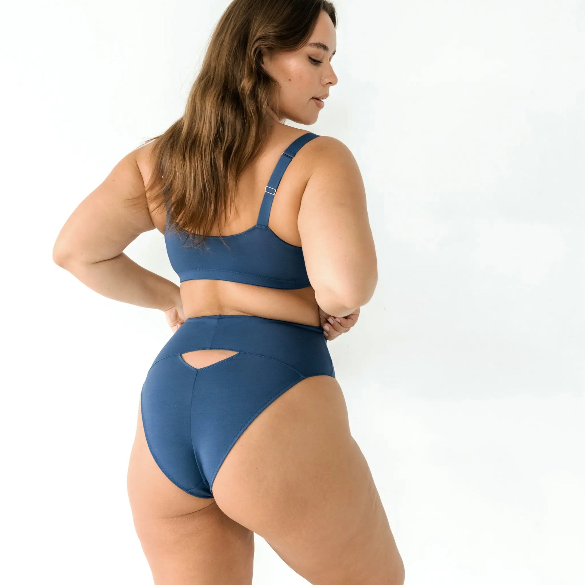 Dark blue modal bralette in a pull-on style with adjustable straps