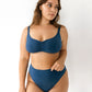 Dark blue modal bralette in a pull-on style with adjustable straps