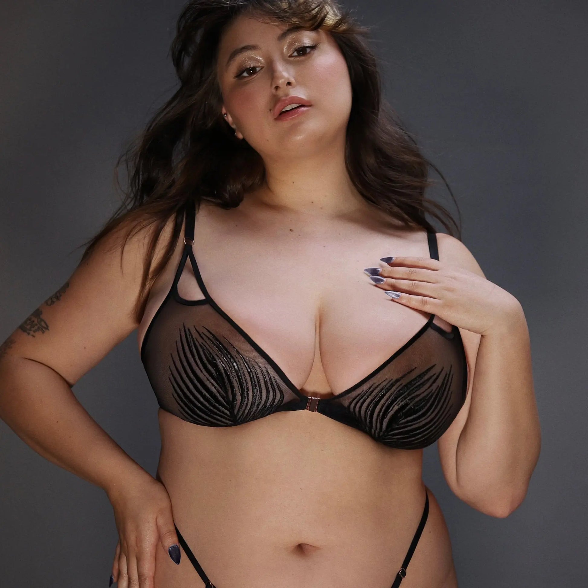 Black rigid tulle bralette with liquid shine effect embroidery with adjustable straps and front closure
