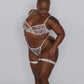 White ultra-fine floral lace balconette bra with flexible underwire, back closure and adjustable straps with matching bikini with corset-style lace up back and lace harness