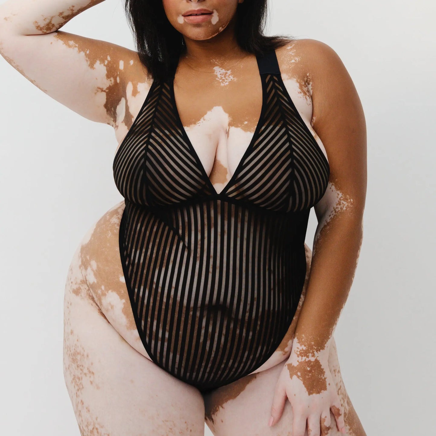 Monique Morin Model 5'8" 38F wearing size 2X