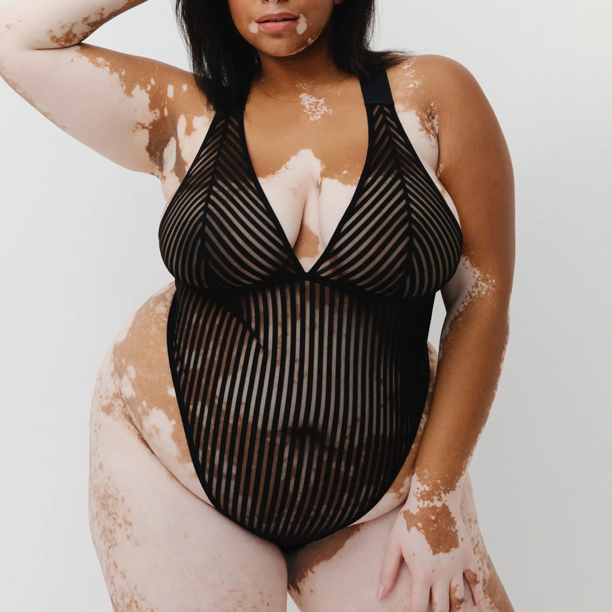 Monique Morin Model 5'8" 38F wearing size 2X