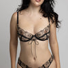 Black ultra-fine tulle with delicate base embroidery demi bra with underwire and center tie with adjustable straps and back closure
