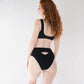 Black high waisted modal brief with back cut-out and black underwire bra top with adjustable back closure