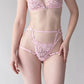 Pale pink soft touch elastic harness, fully adjustable with back clasp closure