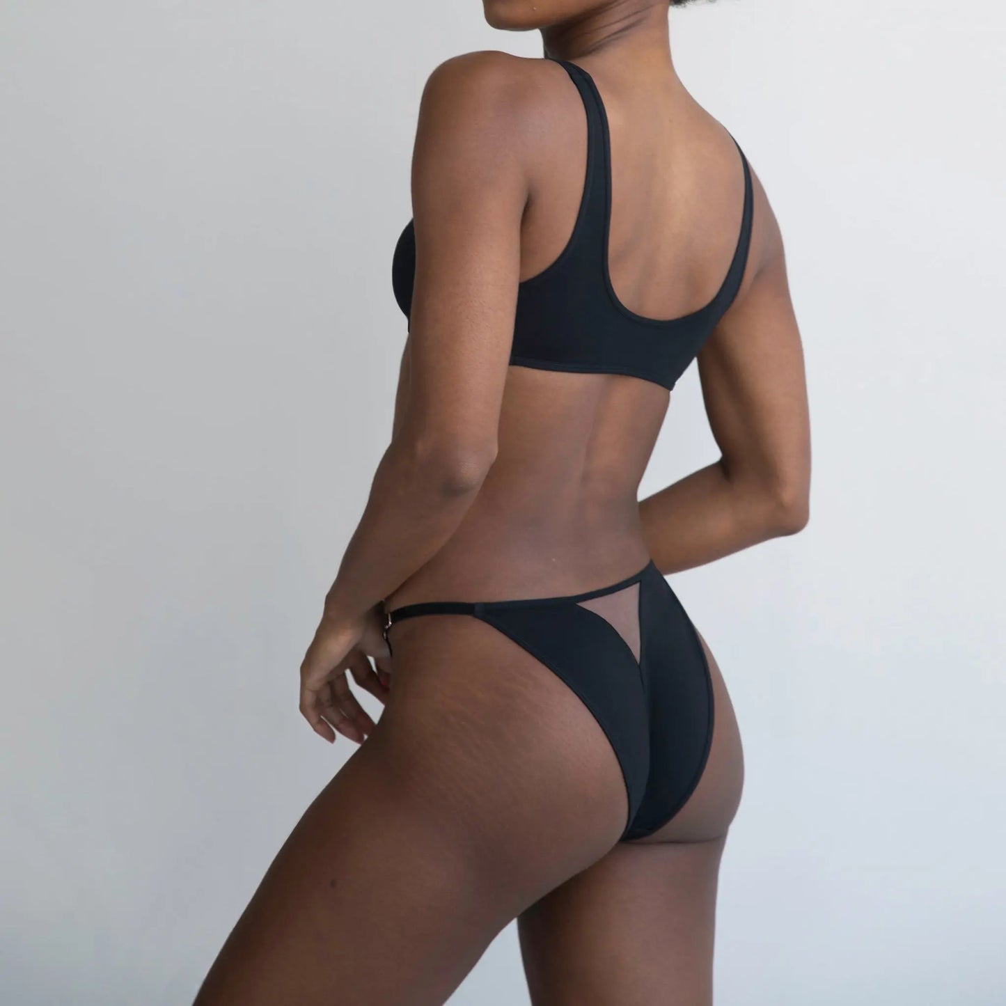 Black modal bikini with narrow back coverage and adjustable side strap