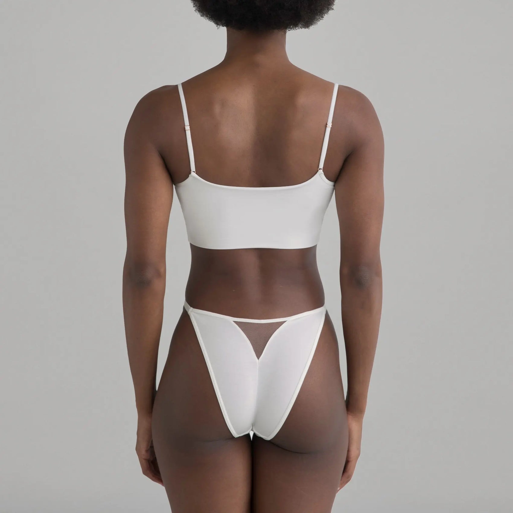 White modal bikini with narrow back coverage and adjustable side strap