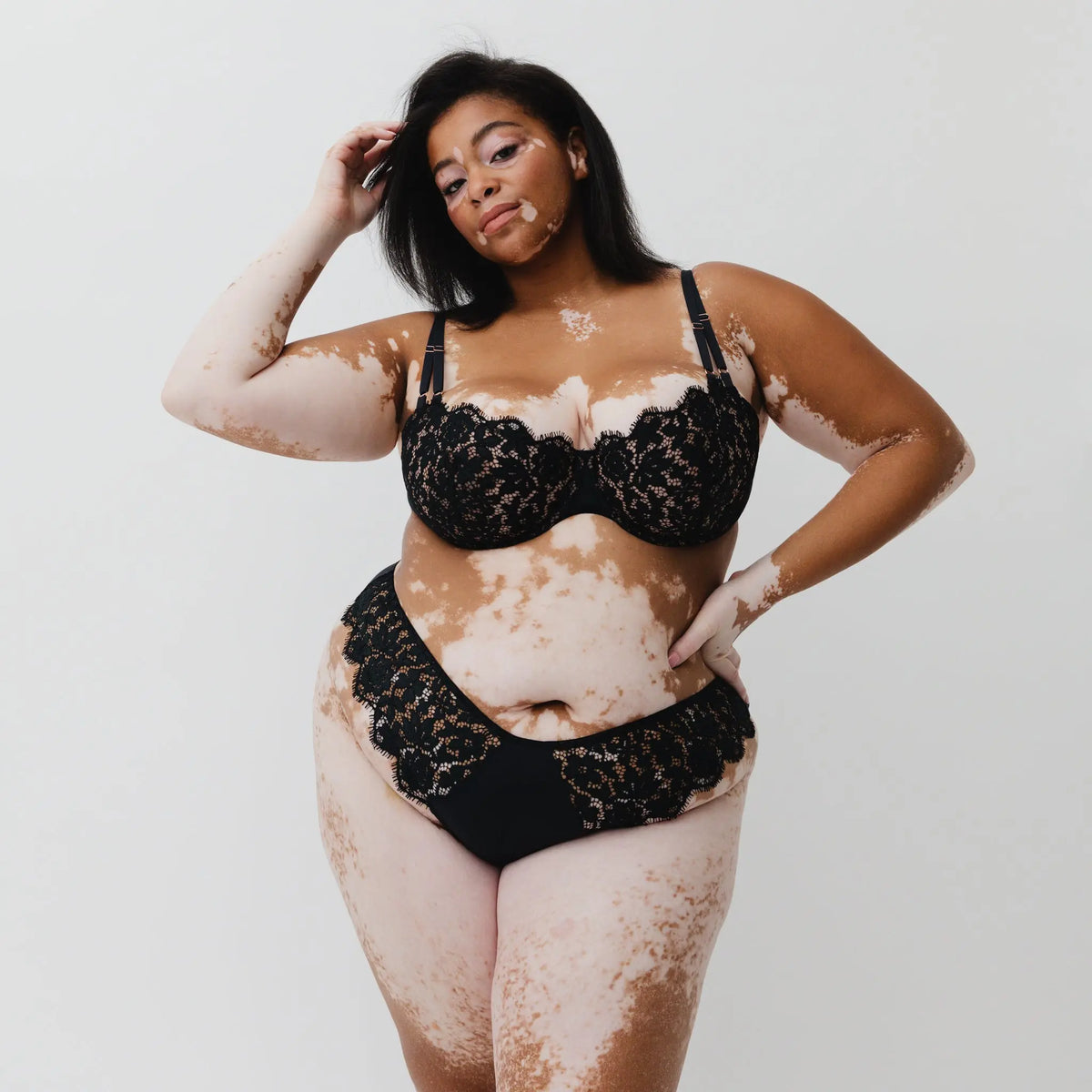 Black lace cheeky panty with scooped waist and soft microfiber lining