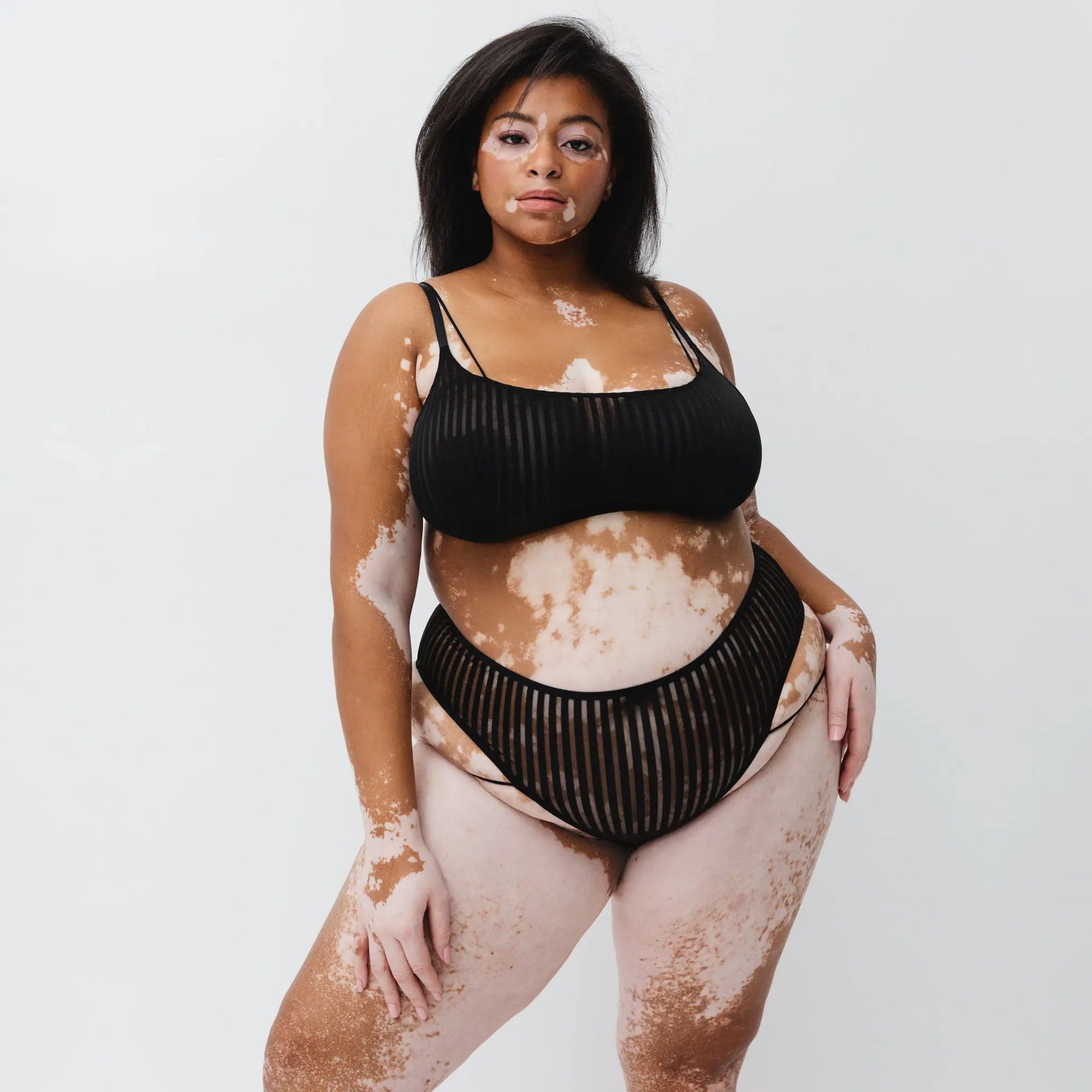 Monique Morin Model 5'8" 38F wearing size 2X