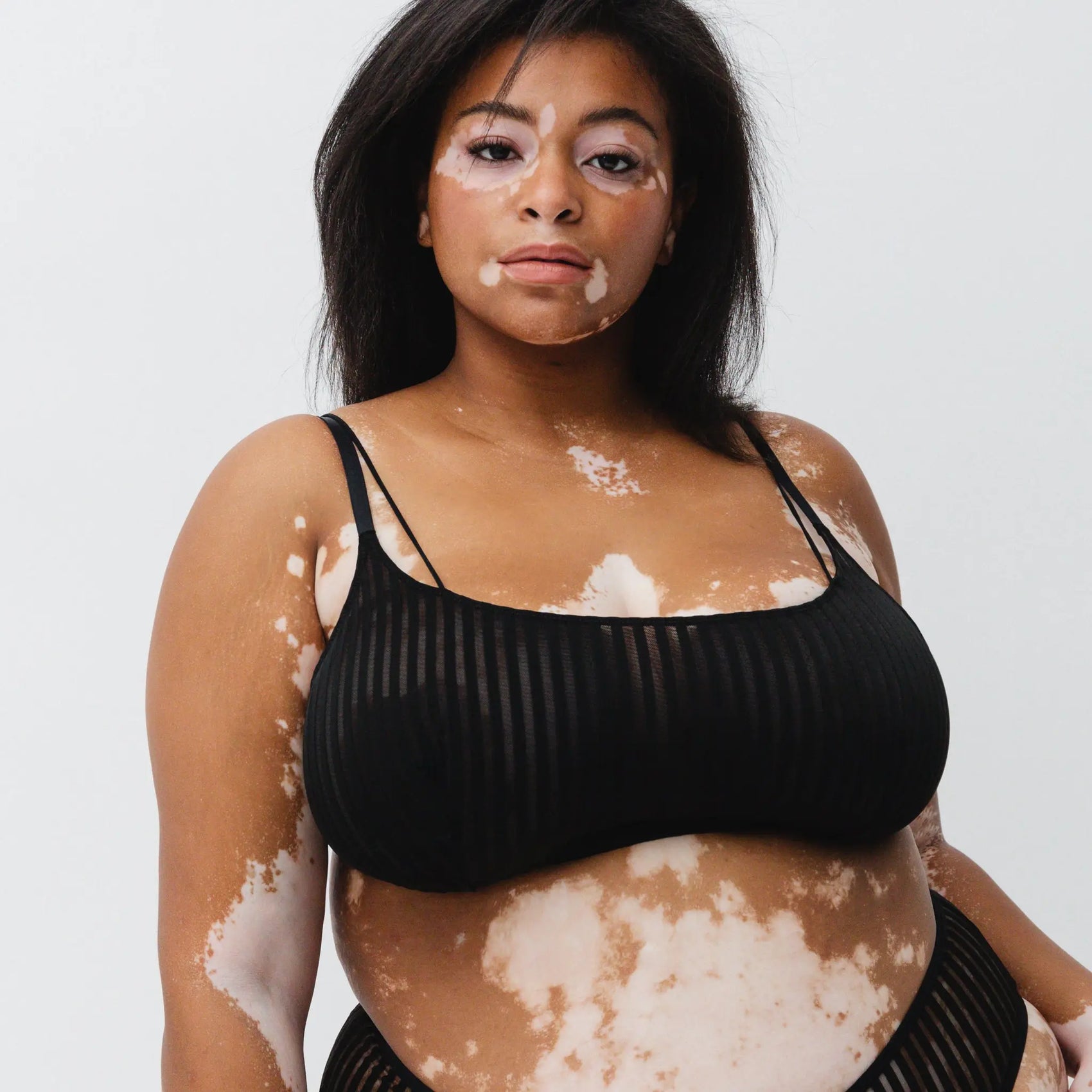 Monique Morin Model 5'8" 38F wearing size 2X