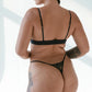 Monique Morin Model 5'11" hip 45" wearing size XL