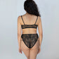 Black stretch lace bralette with adjustable straps, pull-over style